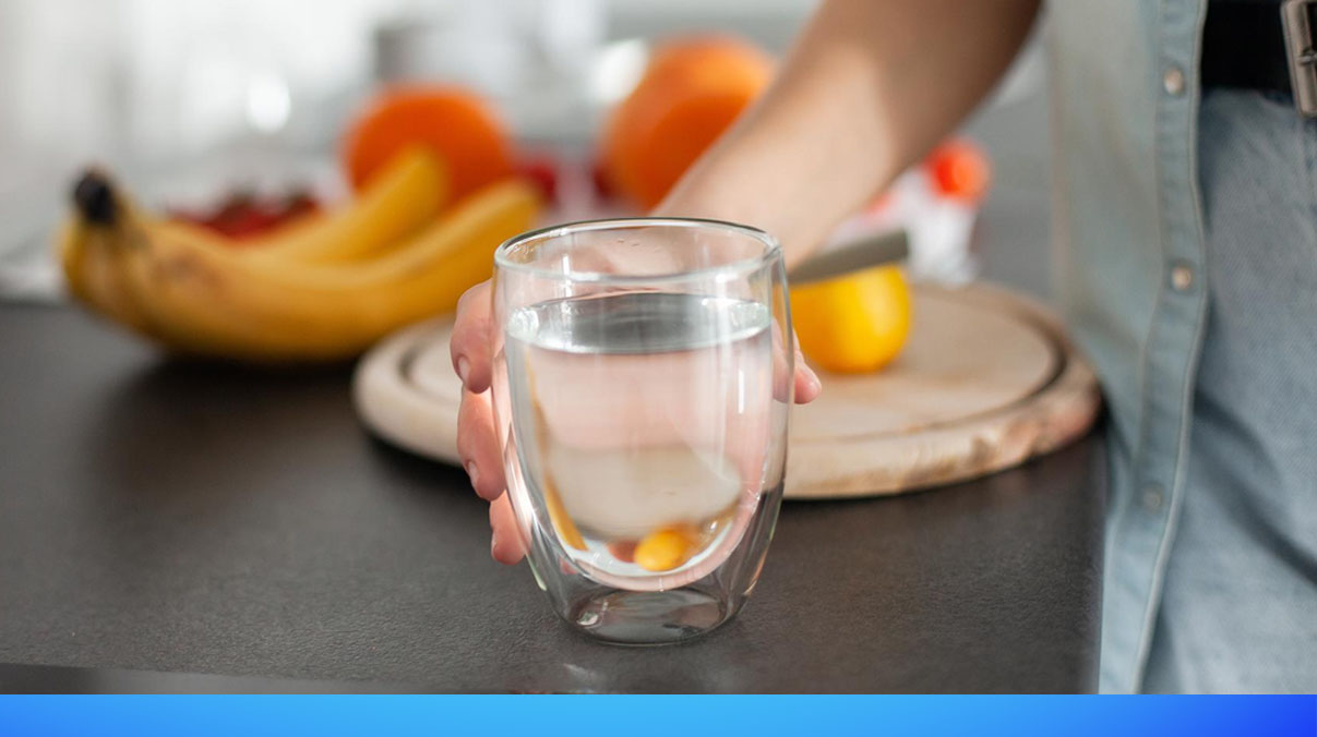 Glass of drinking water representing what is present in treated tap water